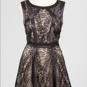 SLEEVELESS CONTOURED LACE FIT AND FLARE DRESS